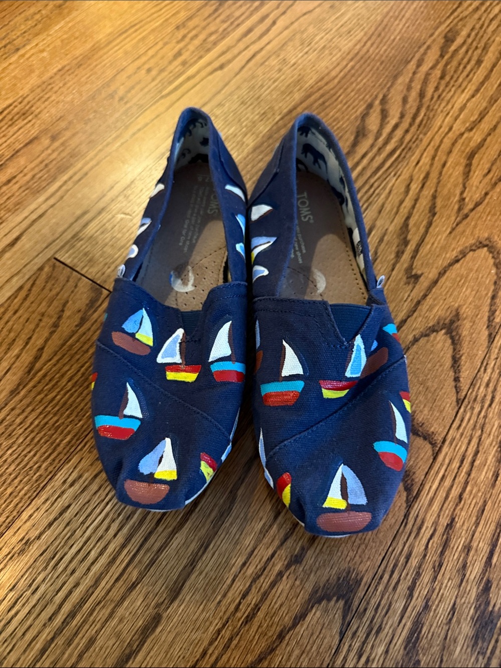 TOMS Handpainted by smith  Navy Canvas Slip-Ons with Colorful Sailboat Print
